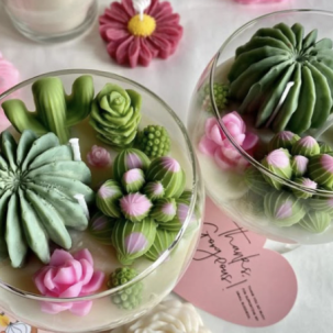Bougies en forme de petits jardins fleuris